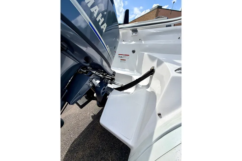 Slide: The Image of 2023 AB Inflatables Nautilus 14 DLX boat with Yamaha outboard motor, rear view. - 10