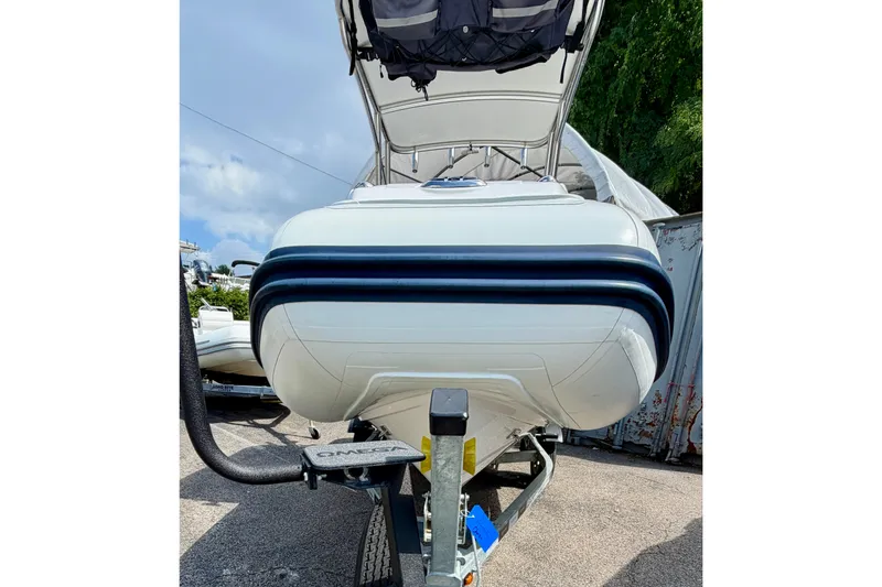 Slide: The Image of 2023 AB Inflatables Nautilus 14 DLX boat on trailer, viewed from the front. - 15