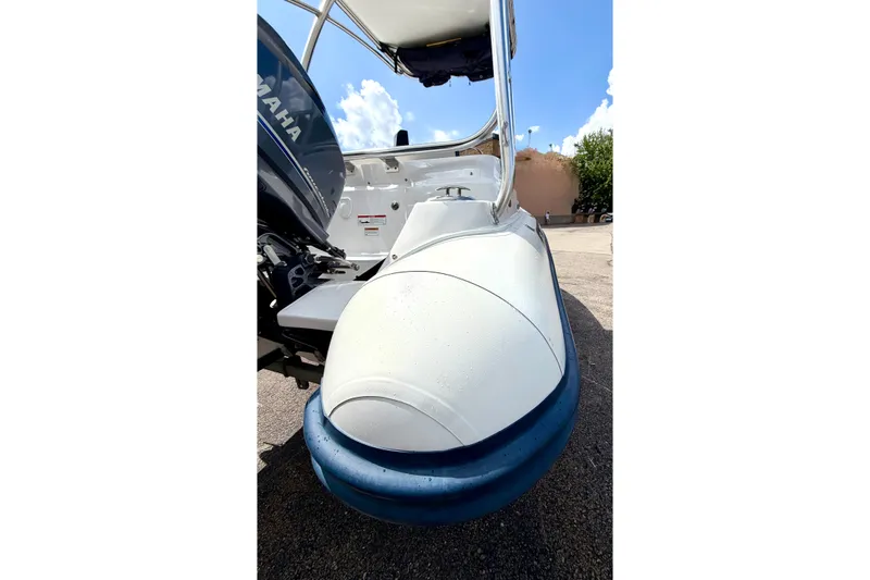 Slide: The Image of 2023 AB Inflatables Nautilus 14 DLX boat with Yamaha engine, parked outdoors. - 11