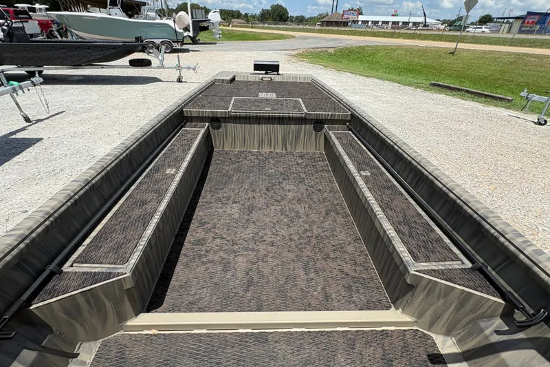 Slide: The Image of 2027 Gator Tail 1860 boat interior with spacious deck and storage compartments. - 14