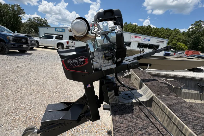 Slide: The Image of Gator Tail 1860 boat with XD3 engine in outdoor dealership setting, 2027 model. - 5