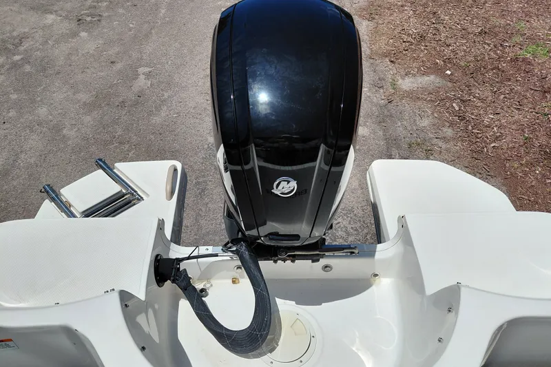 Slide: The Image of 2022 Bayliner Element E18 boat with outboard motor and swim platform. - 26