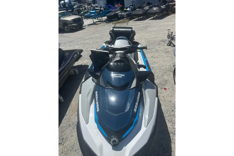 The Image of 2024 Sea-Doo FishPro Sport 170 jet ski in a dealership lot. - 1