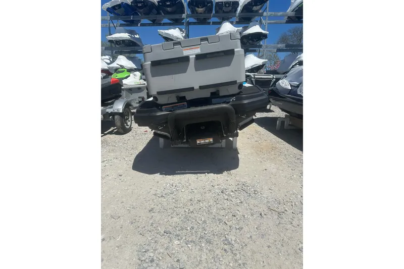 Slide: The Image of 2024 Sea-Doo FishPro Sport 170 jet ski, rear view, parked outdoors. - 10