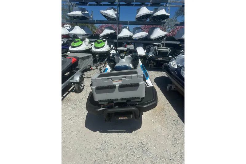 Slide: The Image of 2024 Sea-Doo FishPro Sport 170 jet ski displayed in outdoor showroom. - 9