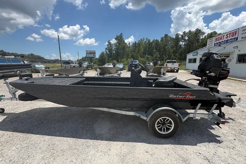 The Image of 2027 Gator Tail 1860 CC Extreme boat on trailer, parked outdoors under a cloudy sky. - 1