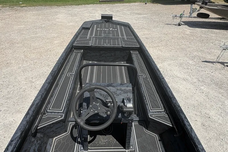Slide: The Image of 2027 Gator Tail 1860 CC Extreme boat with sleek interior design and steering console. - 13