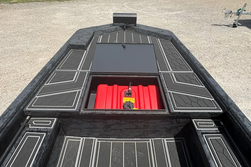 Slide: The Image of 2027 Gator Tail 1860 CC Extreme boat deck with storage compartment open. - 15