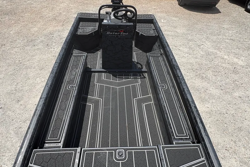 Slide: The Image of 2027 Gator Tail 1860 CC Extreme boat interior with sleek design and steering console. - 14