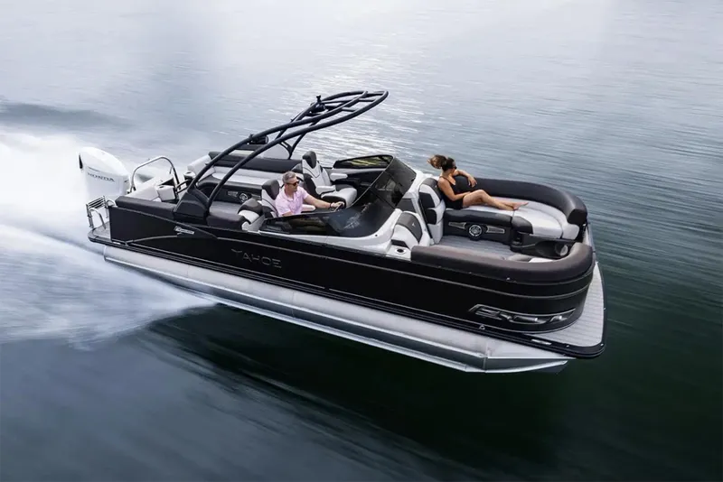 Slide: The Image of Manufacturer Provided Image: 2025 Tahoe Pontoon Cascade Quad Lounger cruising on water. - 0
