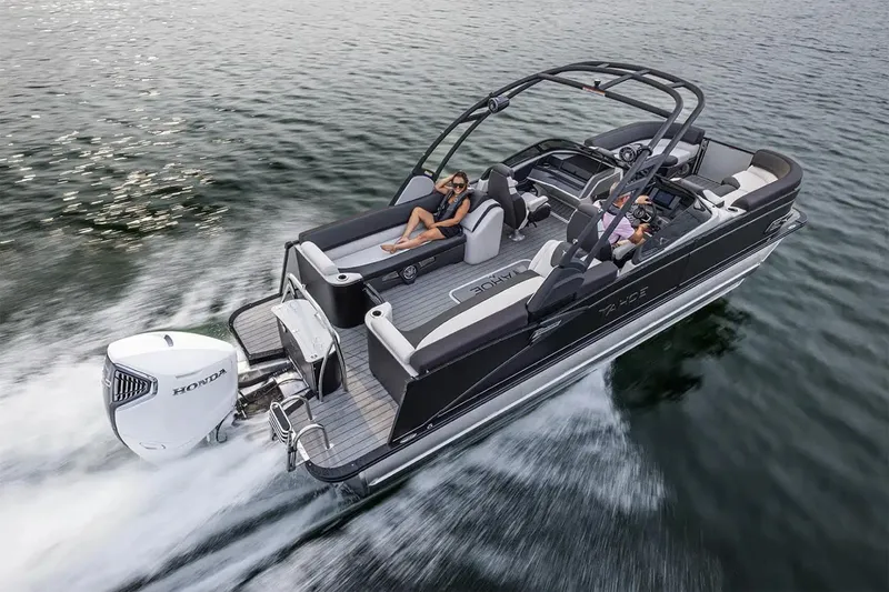 The Image of Manufacturer Provided Image: 2025 Tahoe Pontoon Cascade Quad Lounger cruising on water, featuring sleek design and powerful engine. - 1