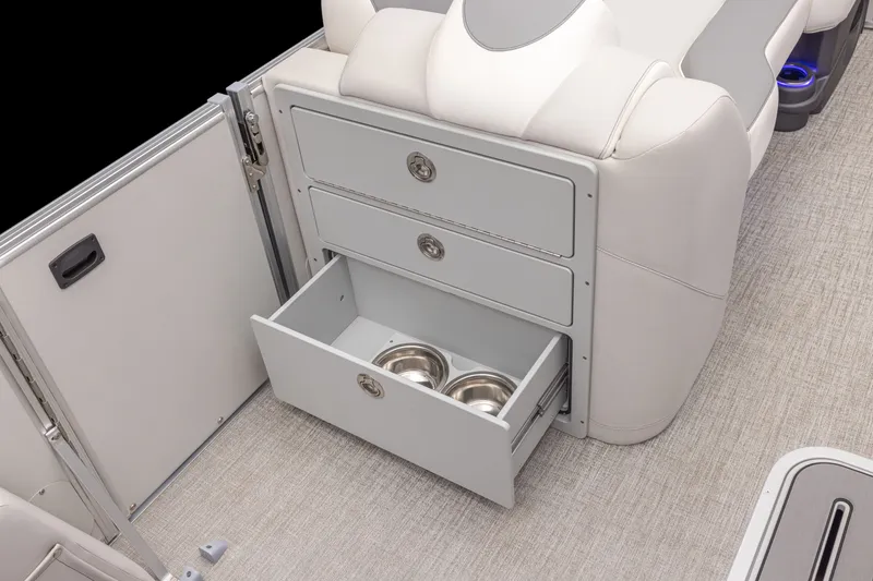 Slide: The Image of An open cabinet with two drawers, one containing two metal bowls. - 13