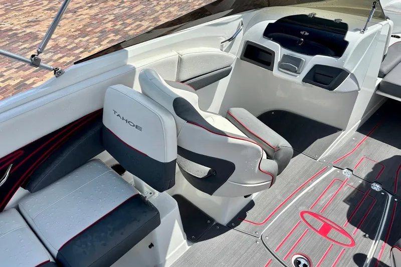 Slide: The Image of 2023 Tahoe 210 S Limited boat interior with sleek seating and modern dashboard design. - 14