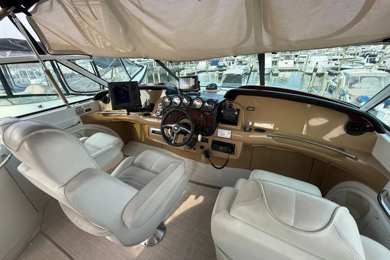 Slide: The Image of Interior helm of 2003 Carver 466 Motor Yacht with modern navigation equipment. - 16