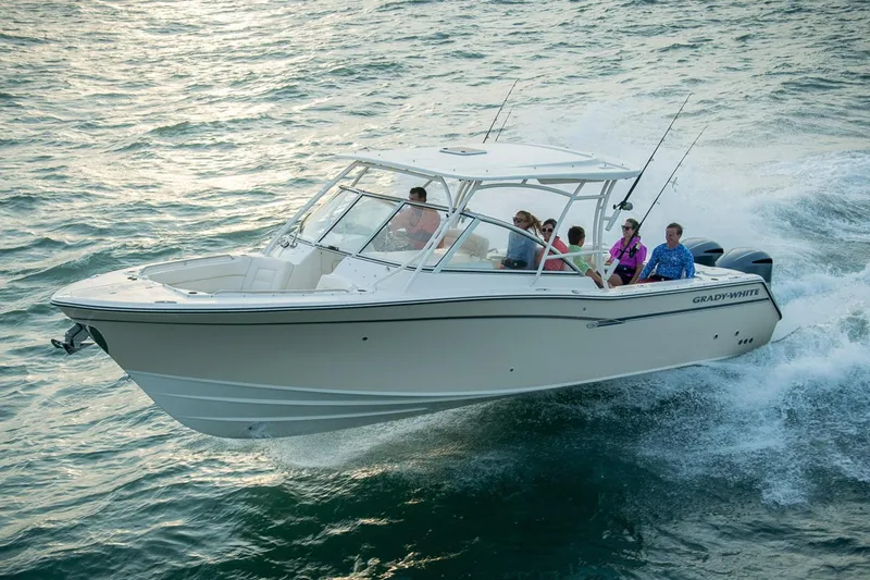 Slide: The Image of Manufacturer Provided Image: 2017 Grady-White Freedom 307 boat cruising with passengers on open water. - 5
