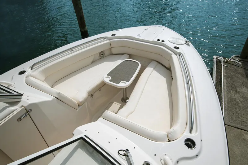 Slide: The Image of Manufacturer Provided Image: 2017 Grady-White Freedom 307 boat interior with cushioned seating and table. - 7