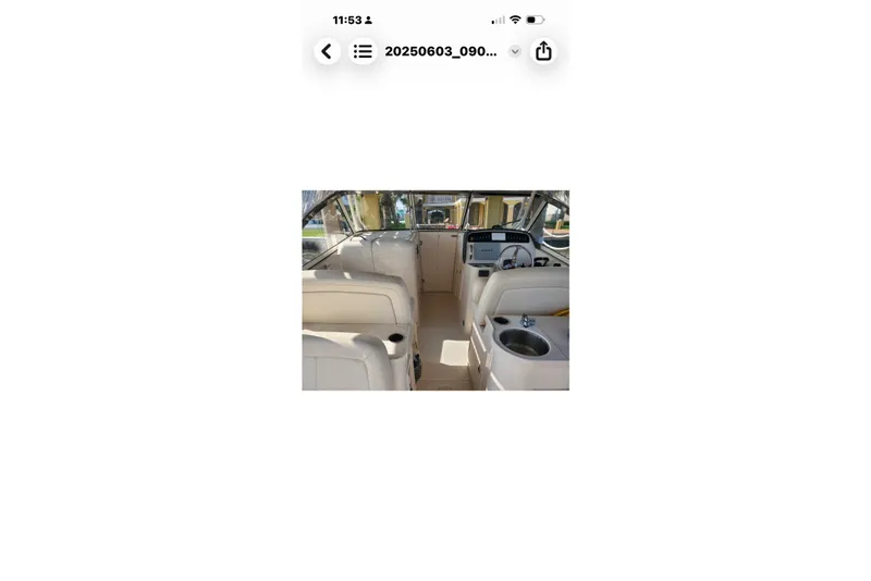 Slide: The Image of Interior view of 2017 Grady-White Freedom 307 boat, featuring helm and seating area. - 33