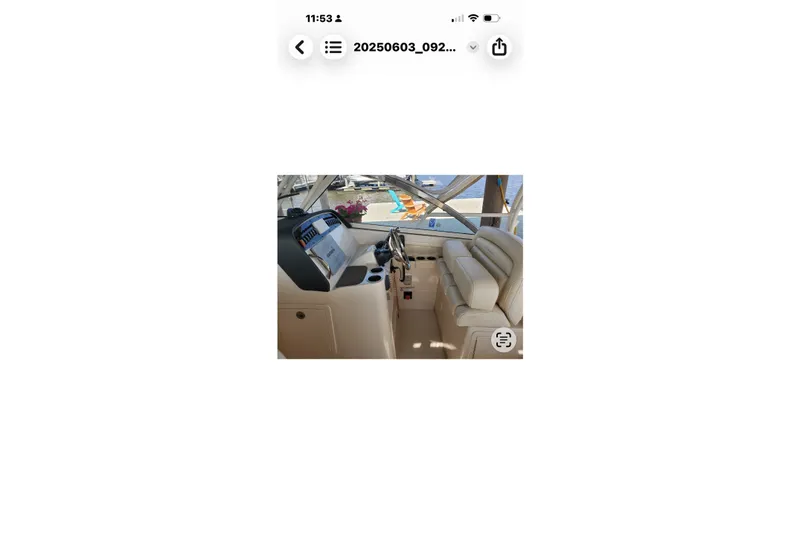 Slide: The Image of 2017 Grady-White Freedom 307 boat interior with steering console and seating. - 29