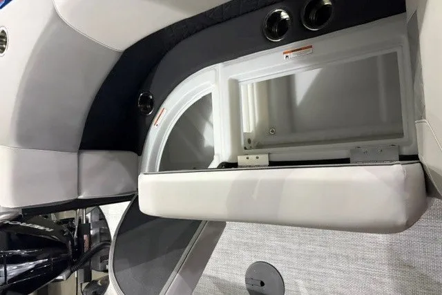 Slide: The Image of Interior of 2027 Alera A24Q boat with open storage compartment. - 11