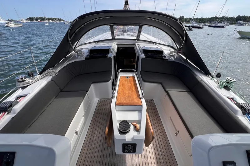 Slide: The Image of Luxurious 2020 Hanse 458 yacht cockpit with sleek seating and elegant wood accents. - 20
