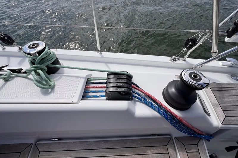 Slide: The Image of Deck of 2020 Hanse 458 sailboat with winches and ropes. - 23