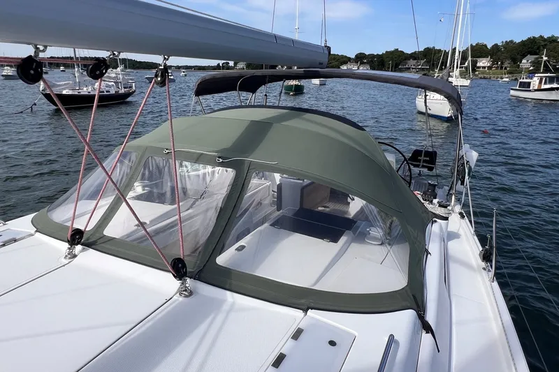 Slide: The Image of Sailing yacht Hanse 458, 2020 model, anchored in a scenic harbor. - 17