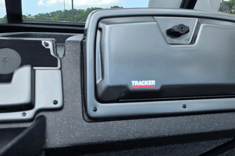 Slide: The Image of 2027 Tracker Pro Guide V-175 Combo dashboard with storage compartment and sleek design. - 18