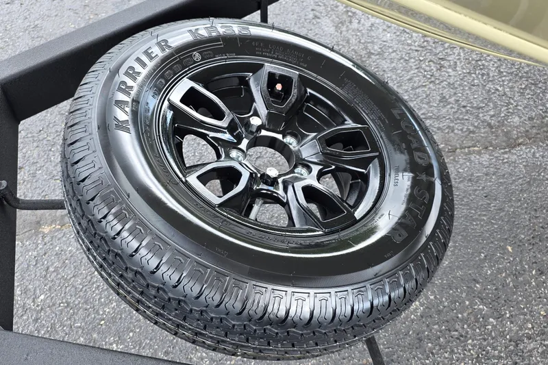 Slide: The Image of Black Karrier KR35 tire on Tracker Pro Guide V-175 Combo, 2027 model. - 24