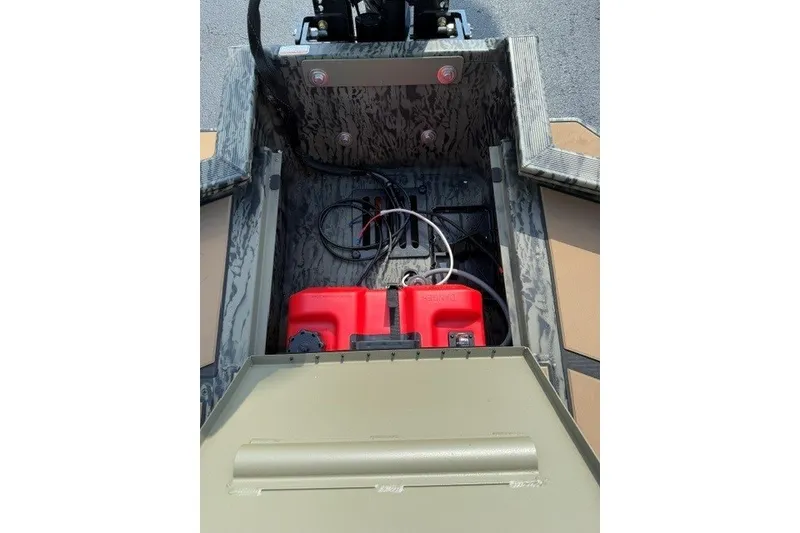 Slide: The Image of Interior view of 2027 Tracker Grizzly 1553 Timber boat showing battery and wiring. - 13