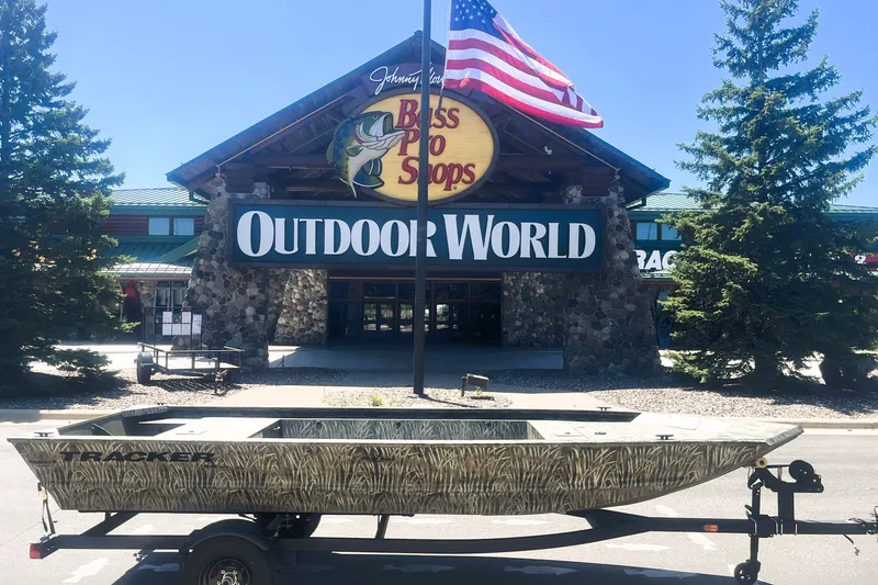 The Image of 2027 Tracker Grizzly 1648 Utility boat outside Bass Pro Shops Outdoor World. - 0