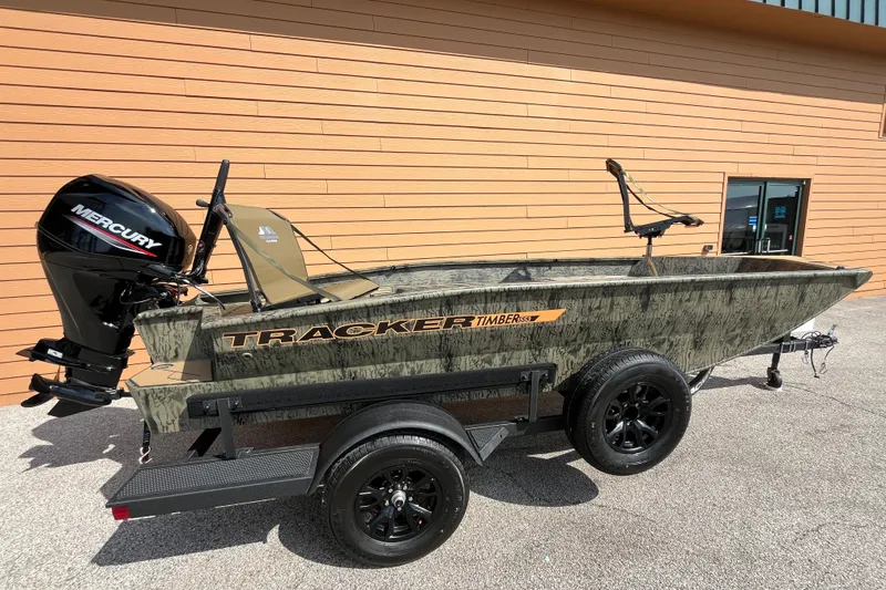 The Image of 2027 Tracker Grizzly 1553 Timber boat with Mercury engine on trailer. - 0