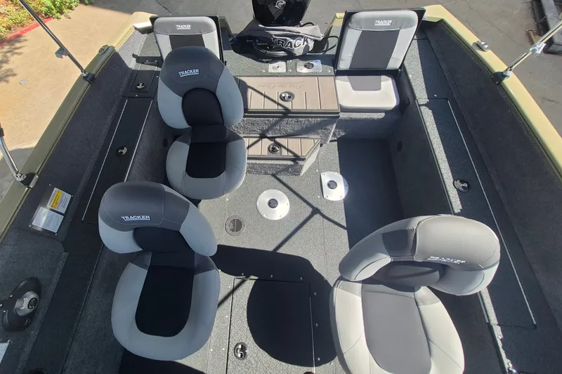 Slide: The Image of 2027 Tracker Pro Guide V-175 Combo boat interior with seating and storage compartments. - 14