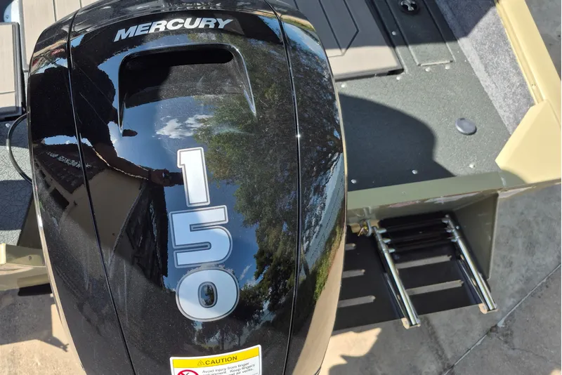 Slide: The Image of Mercury 150 engine on 2027 Tracker Pro Guide V-175 Combo boat, rear view. - 15
