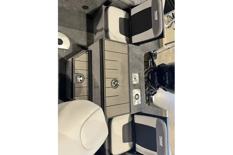 Slide: The Image of 2027 Tracker Pro Guide V-175 Combo boat interior with seating and storage compartments. - 51