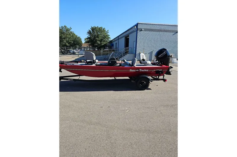 The Image of 2027 Tracker Bass Tracker Classic XL boat in a parking lot, side view. - 0