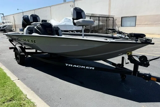 The Image of 2027 Tracker Pro Team 175 boat on trailer, parked outdoors. - 0