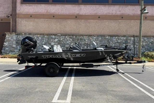 The Image of 2027 Tracker Pro Team 175 boat parked in a lot, side view. - 0
