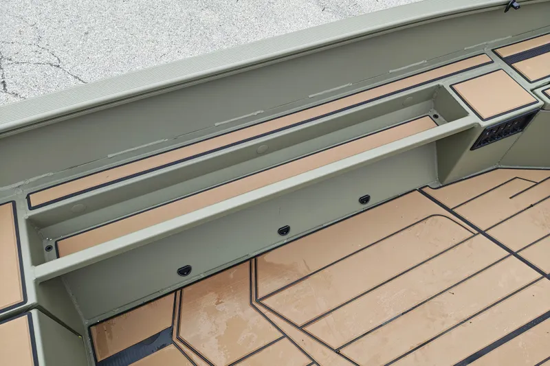 Slide: The Image of Interior view of 2027 Tracker Grizzly 1553 Timber boat with storage compartments. - 17