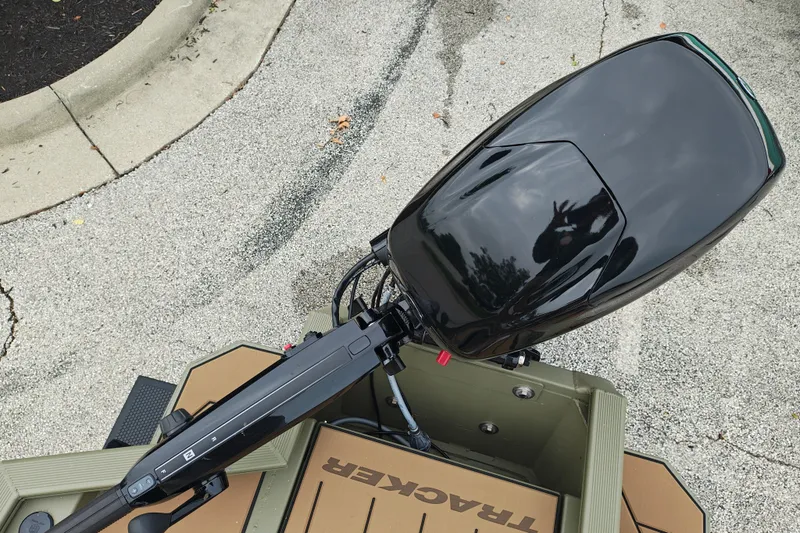 Slide: The Image of Top view of a 2027 Tracker Grizzly 1553 Timber boat motor. - 21