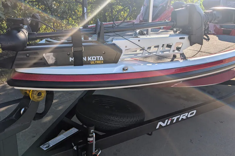 The Image of Nitro Z18 XL 2027 boat with Minn Kota Ultrex motor on trailer. - 0