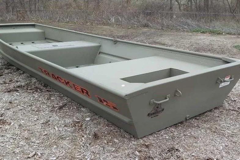 The Image of 2027 Tracker Grizzly 15 Jon boat in a natural outdoor setting. - 0