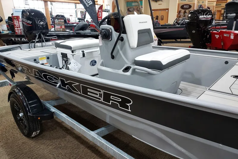 The Image of 2027 Tracker Bass Tracker Classic CC boat on display, featuring sleek design and comfortable seating. - 0