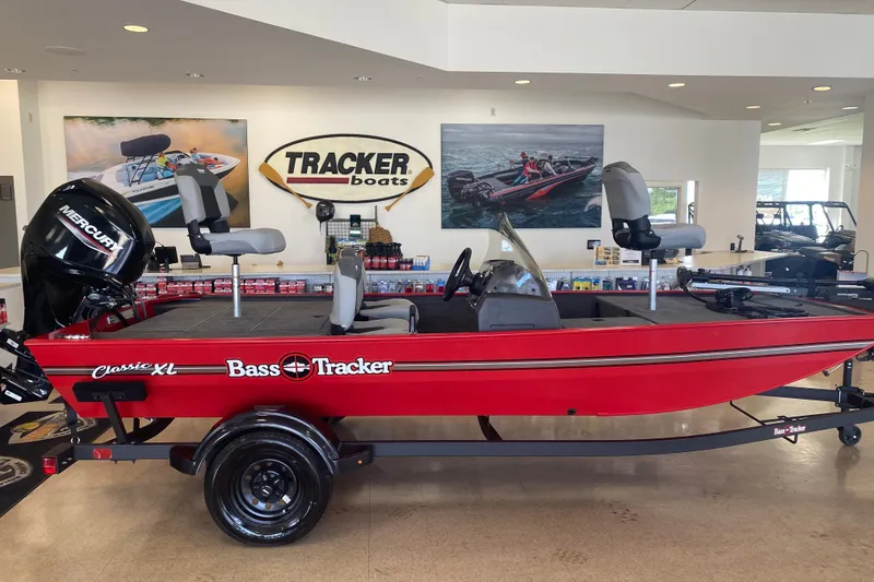 The Image of 2027 Tracker Bass Tracker Classic XL boat in showroom, red exterior, Mercury engine. - 0