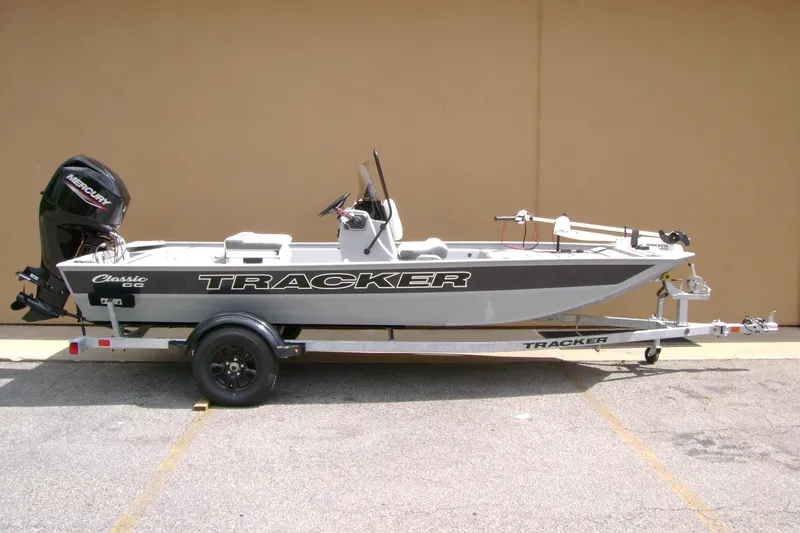 The Image of 2027 Tracker Bass Tracker Classic CC boat on trailer, side view. - 0
