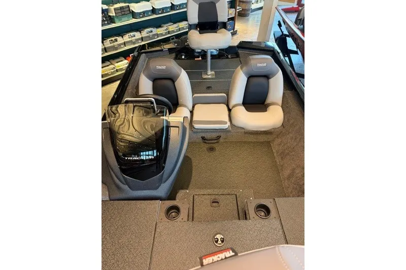 Slide: The Image of 2027 Tracker Pro Team 175 boat interior with seating and storage compartments. - 16