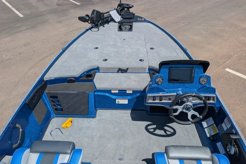 Slide: The Image of 2027 Nitro Z18 XL Pro boat interior with steering wheel and control panel. - 6