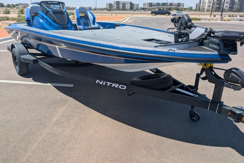 Slide: The Image of 2027 Nitro Z18 XL Pro boat on trailer in parking lot. - 3