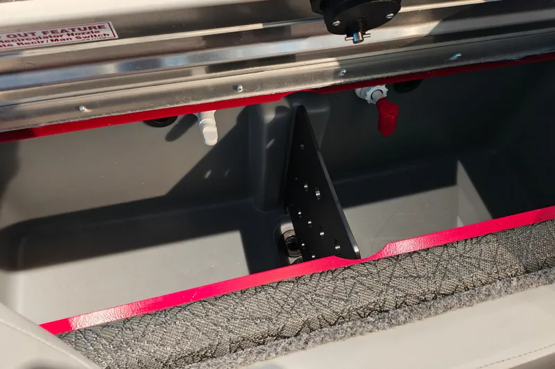 Slide: The Image of Open compartment of 2027 Tracker Pro Team 175 boat, showcasing interior details. - 23