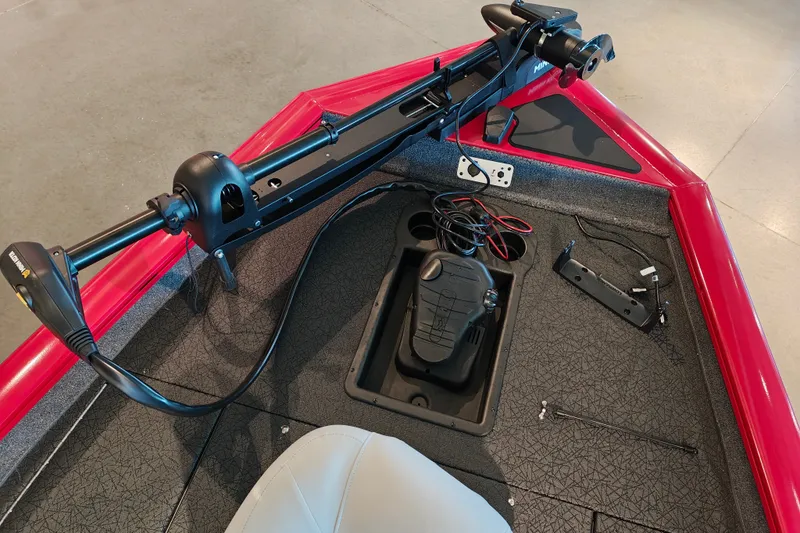 Slide: The Image of 2027 Tracker Pro Team 175 boat interior with trolling motor and control panel. - 18