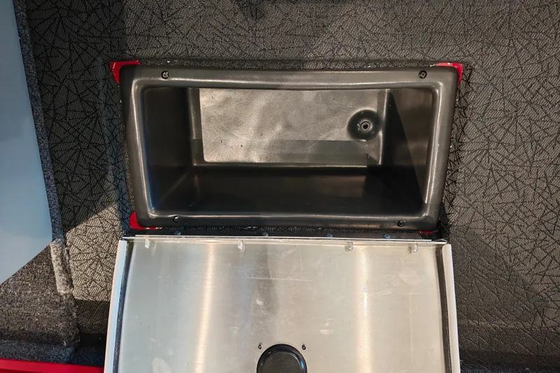 Slide: The Image of Open storage compartment in 2027 Tracker Pro Team 175 boat, featuring durable interior design. - 24